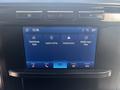 A digital display interface of a 2023 Ford F-350 SD showing the time, temperature, and options for apps including Apple CarPlay and Android Auto