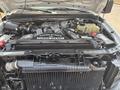 Engine compartment of a 2009 Ford F-450 Super Duty with a Power Stroke V8 Turbo Diesel engine visible
