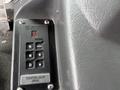 Control panel of a 2006 E-One Typhoon featuring buttons for transmission settings including park reverse neutral and drive along with a pumping gear switch