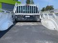A 2017 Ford F-250 SD truck bed showing a flat surface with a textured floor and a metal railing along the top edge