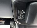 Two USB ports labeled 1 and AUX are located on the dashboard of a 2021 RAM 5500