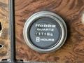 Hobbs hour meter displaying 1896.3 hours on a 1996 Kenworth T800 dashboard with a round dial and silver trim