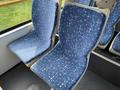 Two blue patterned bus seats with abstract design in a 2016 Grande West Vicinity bus