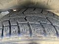 Close-up of a tire from a 2016 Ford Transit 150 showcasing detailed tread patterns and wear on the rubber surface