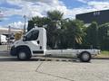 A 2023 RAM Promaster 3500 chassis cab in white with a bare frame and no cargo box visible