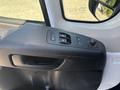 Interior view of a 2020 RAM ProMaster 3500 driver side door panel featuring window controls and a speaker