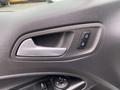 Interior door handle and lock buttons of a 2017 Ford Transit Connect