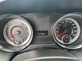 Dashboard of a 2014 RAM Cargo Van showing speedometer and tachometer with odometer reading 115788 kilometers