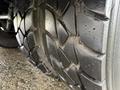 Close-up of a 2005 Freightliner M2 106 tire showing deep grooves and tread pattern designed for traction and stability