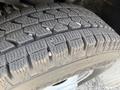 Close-up of a tire from a 2020 Chevrolet Express highlighting the tread pattern and surface texture