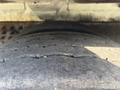 Close-up view of the worn tire tread on a 2011 Autocar Xpeditor showing visible grooves and wear patterns
