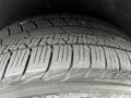 A close-up of a tire belonging to a 2020 Mercedes-Benz Metris showcasing its tread pattern and surface detail