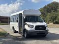 A 2018 Ford Transit-350 with a white exterior features an open sliding door and a front grille with the Ford logo