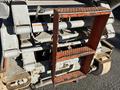 A 2010 Skyjack SJ with a worn orange access step and metal components showing signs of rust and use