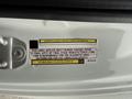 Label on the door frame of a 2024 RAM 5500 providing vehicle tire and loading information along with instructions for the final stage manufacturer