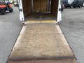A 2016 Continental cargo trailer featuring a wooden floor and a foldable ramp for loading and unloading items