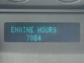 Display showing "ENGINE HOURS 7884" in a digital format on the dashboard of a 2015 Ford F-350 SD