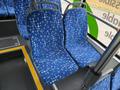 Two blue bus seats with a star pattern inside a 2018 Grande West Vicinity bus