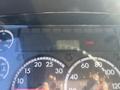 Dashboard of a 2006 Freightliner M2 106 displaying gauges for oil pressure, temperature, fuel level, and an hour meter showing 11006.3 hours