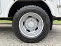 A 2008 Ford F-450 SD wheel featuring a silver rim and a Michelin tire with a robust tread pattern