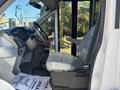 2017 Ford Transit-350 interior view showcasing the driver's seat and steering wheel with a thank you mat on the floor