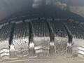 Close-up view of a 2019 Ford Transit Connect tire showing tread pattern with clear grooves and ridges designed for grip and traction