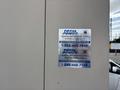 A metal sticker displaying contact information for Total Power services related to generators, including emergency service and parts rentals