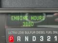 Display screen showing engine hours of 2008 Ford F-450 SD indicating a total of 3880 hours with fuel information below and gear indicators visible