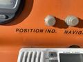 Close-up of a control panel on a 2007 Fassmer 20 Foot Fast Rescue Boat featuring labeled buttons for position indicator and navigation along with a marine radio display