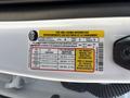 Tire and loading information label on a 2021 Ford F-150 providing details about seating capacity and tire pressure specifications