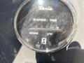 Close-up of a Faria elapsed time meter displaying 0402.1 hours on a 2013 Larson 238 boat