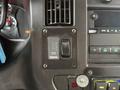 Dashboard controls of a 2019 Chevrolet Express showing power level settings and interior light switch