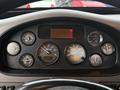 Dashboard of a 2020 Peterbilt 330 featuring various gauges including speedometer tachometer and fuel level indicators
