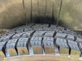 A close-up of a tire from a 2019 Mercedes-Benz Sprinter showcasing a deep tread pattern designed for traction and stability