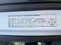 A 2017 Chevrolet Colorado with a label displaying vehicle specifications including Gross Vehicle Weight Rating and tire information