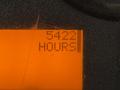 A close-up of a digital display showing "5422 HOURS" indicating the operational hours of a 2013 International 4300 vehicle