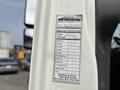 A service performed label on a 2013 International WorkStar detailing maintenance records including date mileage and parts replaced