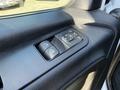 A control panel with buttons for operating windows and mirrors in a 2023 Mercedes-Benz Sprinter 2500