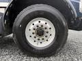 Close-up of a 2018 Kenworth T800 tire showing the tread and wheel rim with visible lug nut details
