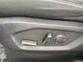 A control panel for adjusting the seat position in a 2017 Ford Edge featuring buttons for recline and height adjustment