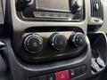 Climate control knobs and buttons in the dashboard of a 2021 RAM Promaster