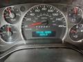 Dashboard of a 2020 Chevrolet Express showing speedometer fuel gauge and engine hours display at 6674.9