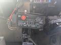 A control module labeled as a single line timer for a 12-24 volt system with various connectors and a red button