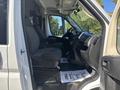 A 2020 RAM ProMaster 3500 interior showing two front seats and the dashboard with controls and a console