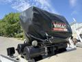 A VMAC gas-driven air compressor mounted on the bed of a 2020 Ram 2500 truck