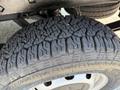 Close-up of a tire from a 2022 Ford Transit showing detailed tread pattern and sidewall design