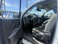 Interior view of a 2016 RAM 5500 showing the driver's seat dashboard and steering wheel with a focus on the door and front cabin layout