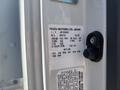 A 2022 Isuzu NRR vehicle identification label showing specifications and options including VIN engine and transmission details