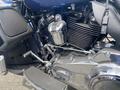 Close-up of a 2017 Harley-Davidson FLHTKL motorcycle engine showcasing chrome parts and detailed craftsmanship