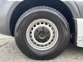 Wheel of a 2020 Mercedes-Benz Sprinter 2500 featuring a silver rim and a black tire with visible tread patterns